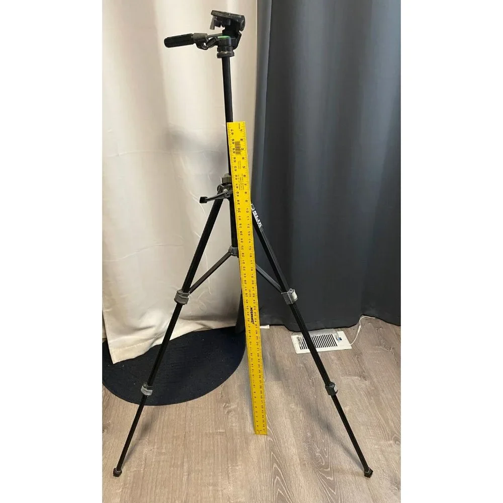 Slik Universal U-112 Tripod extends from 22